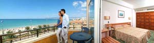 Comfort double or twin with balcony, private facilities (bath and shower), and half board